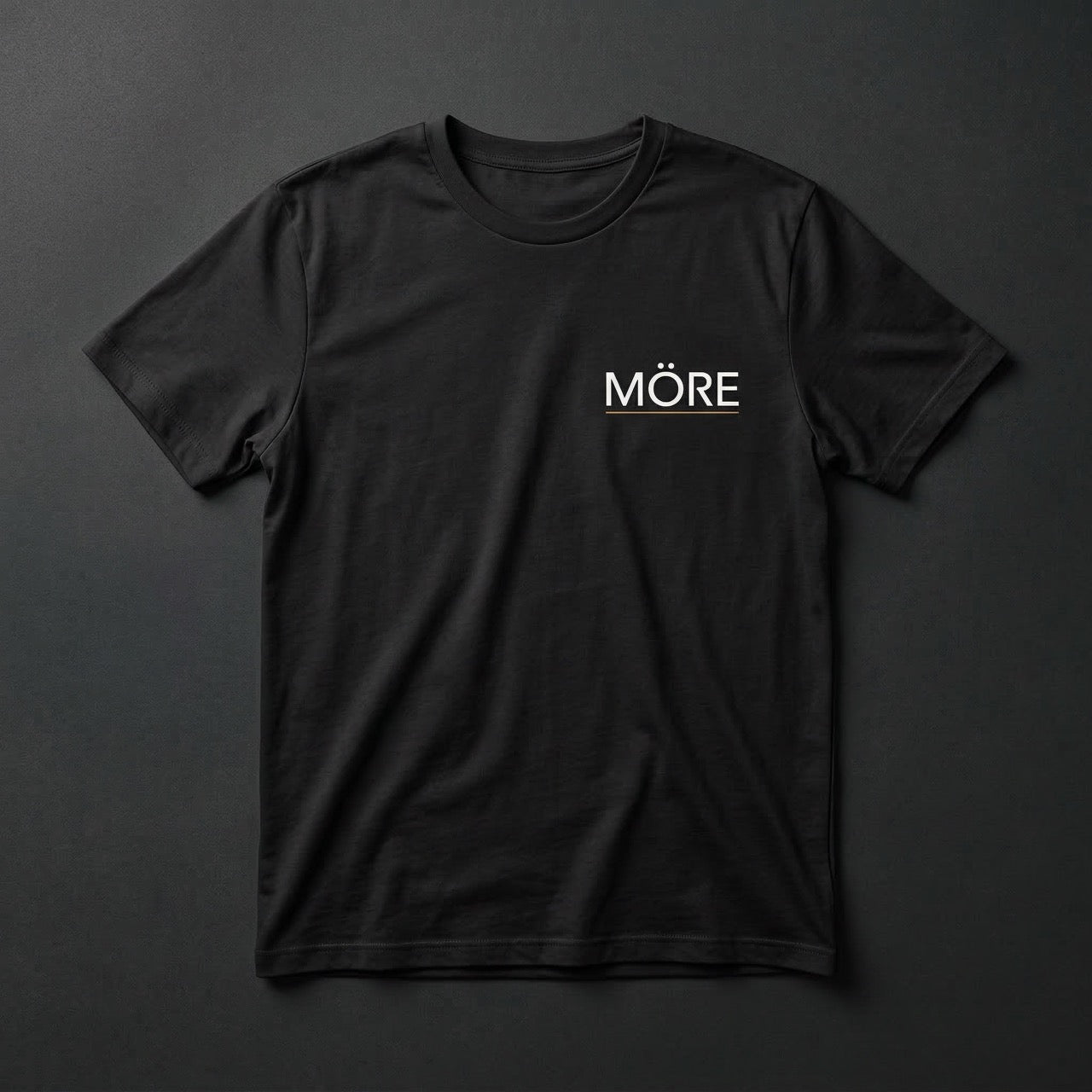 Black t-shirt with 'Möre' text on a dark gray background